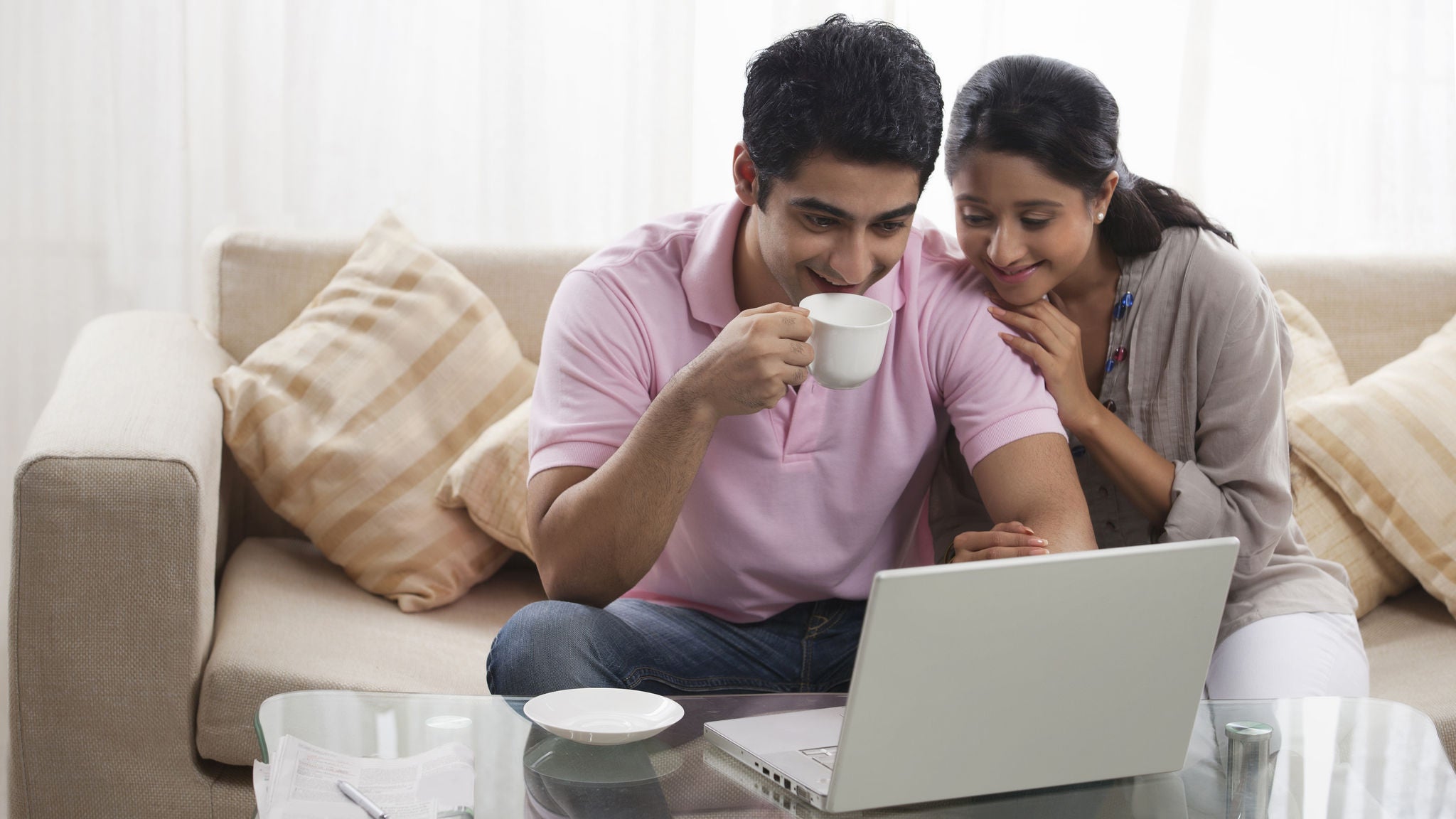 Couple looking at their home loan interest rate