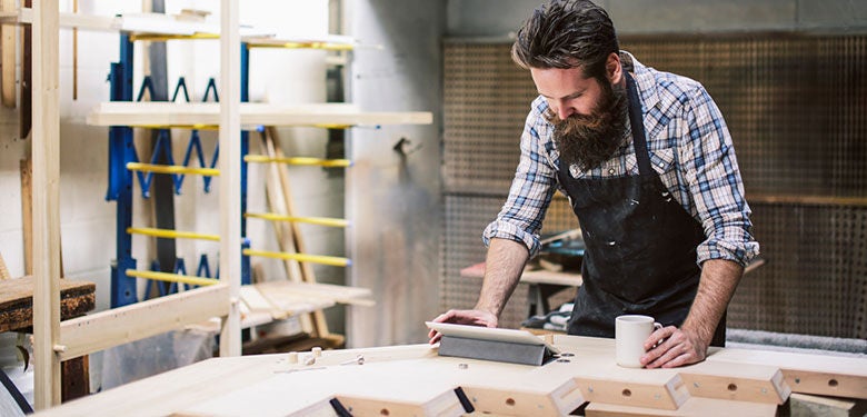 business owner reading about home loan application